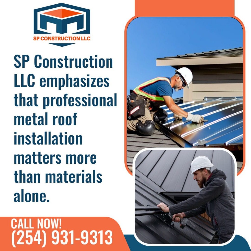 Roofers installing standing seam metal roofing panels on residential home